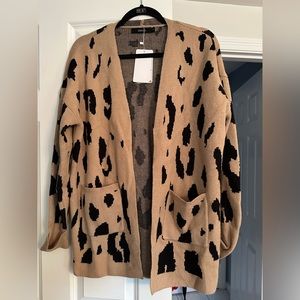 Brand new leapard design cardigan sweater.
